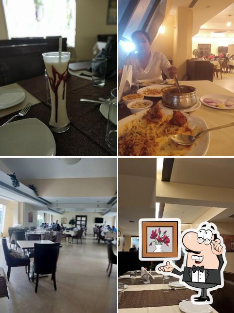Take a seat at one of the tables at Sentosa Multi Cuisine Restaurant