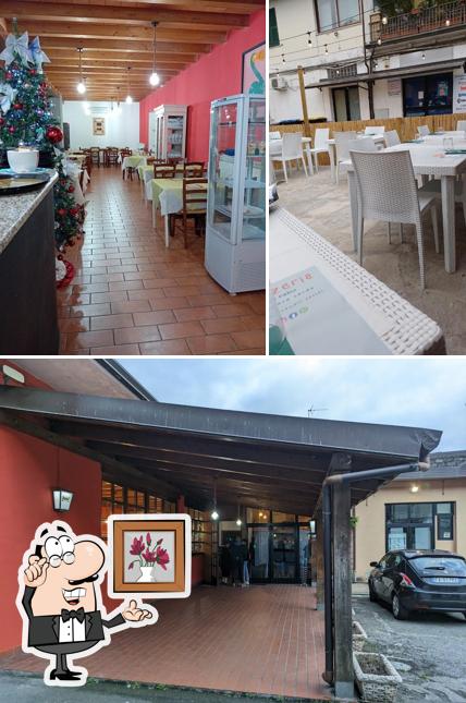 Questa è la foto che presenta la interni e esterno di Pizzeria da Fabio