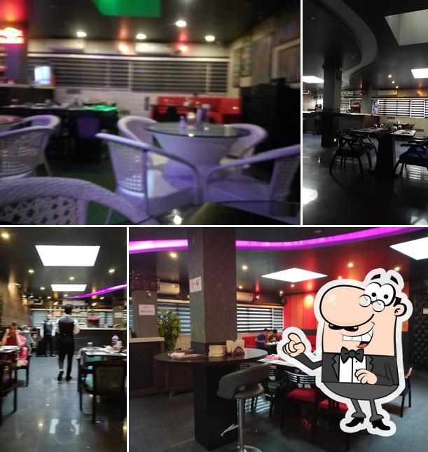 Take a seat at one of the tables at Mikado Restaurant