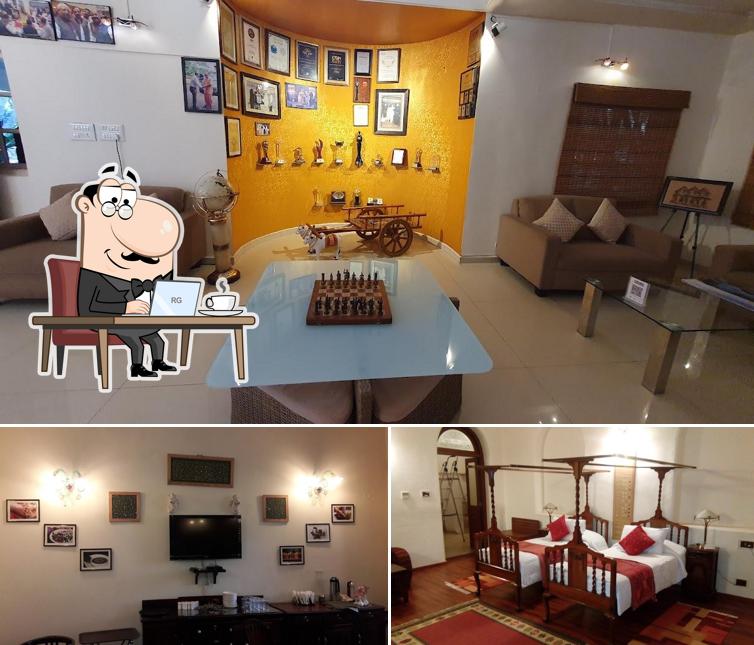 Take a seat at one of the tables at Vijayshree Resort, Hampi