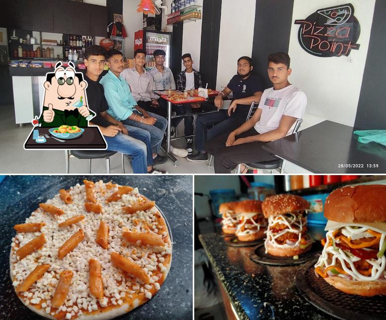 The photo of food and interior at Pizza Point Nadaun