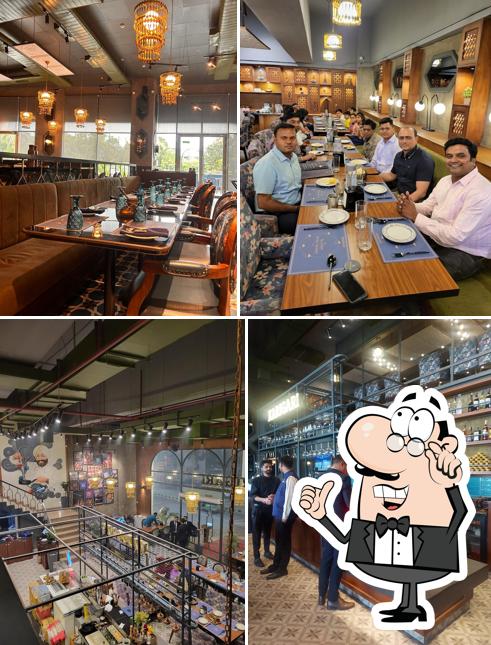 Take a seat at one of the tables at Karigari Noida Sec 51