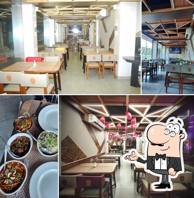 Take a seat at one of the tables at Cafe Stadia
