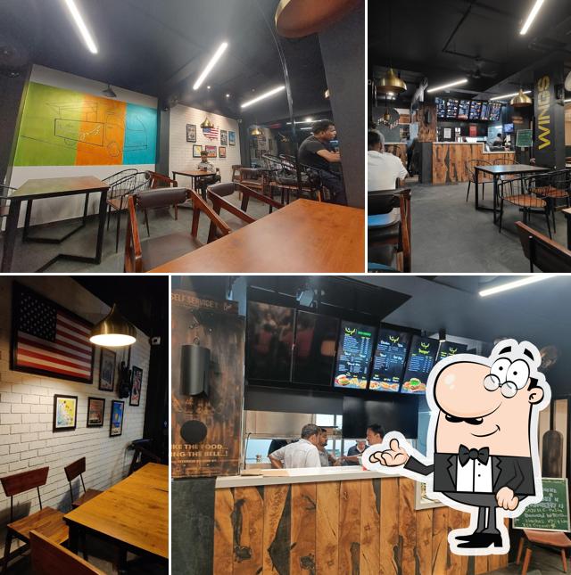 Take a seat at one of the tables at The Wings