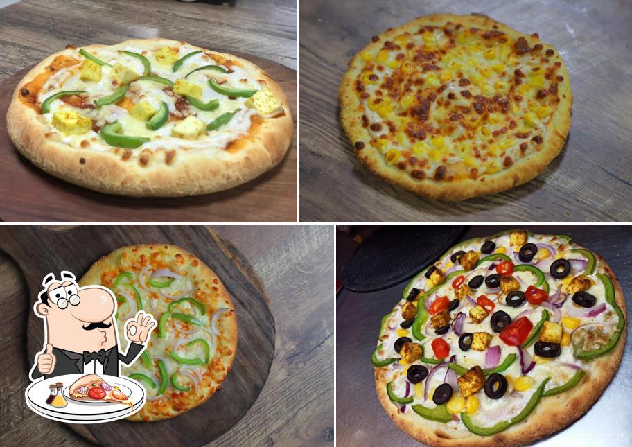 At Hungry Point - Batala, you can try pizza