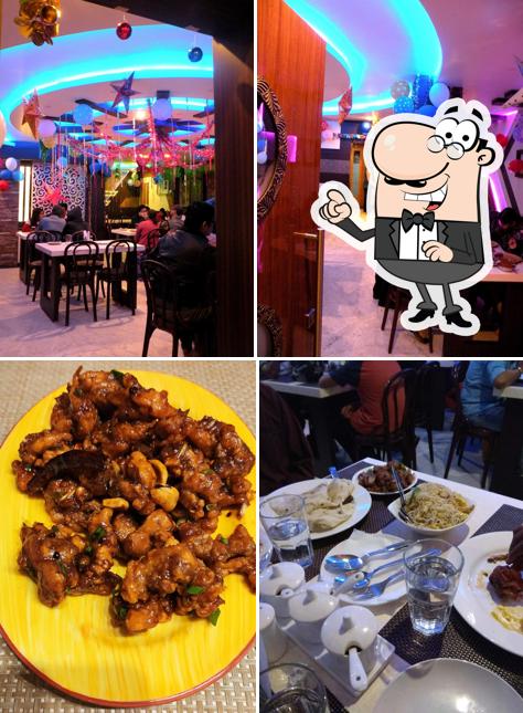 Take a seat at one of the tables at Samrat RestauranT