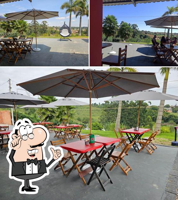 A imagem da interior e exterior a Caminho da Roça Restaurante e Pizzaria