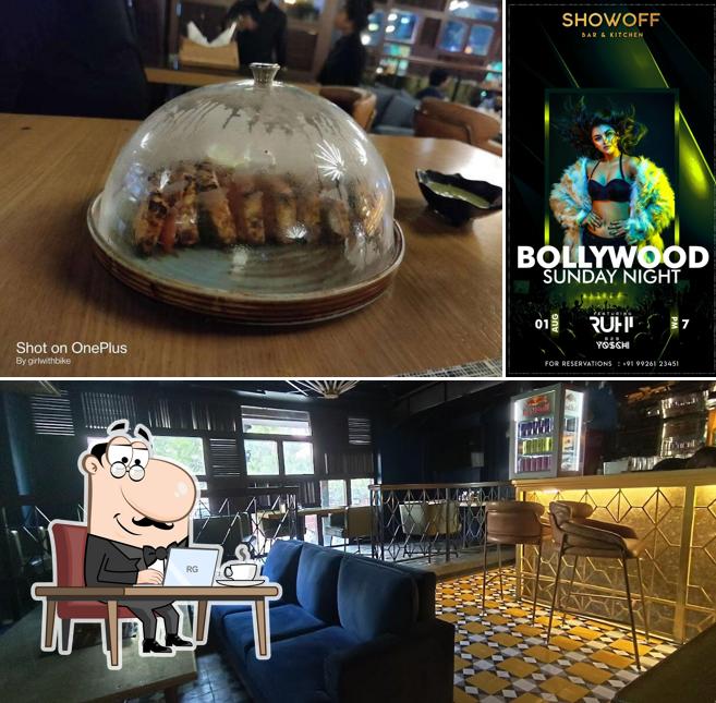Take a seat at one of the tables at Tandoor Club and Bar