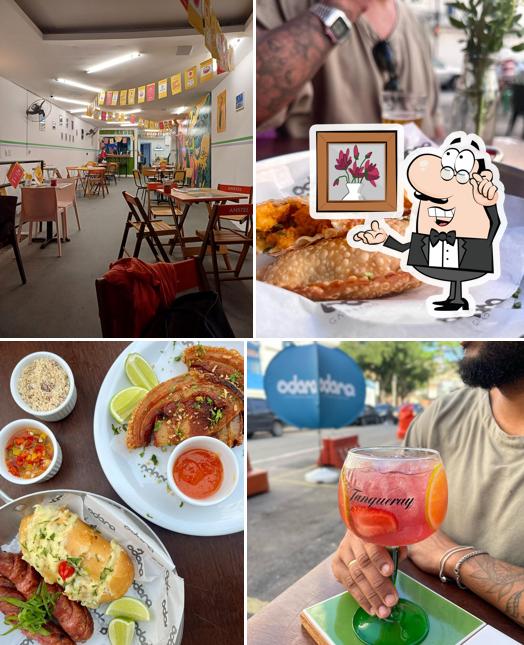 Sente em uma das mesas no Odara Gastrobar Urbano