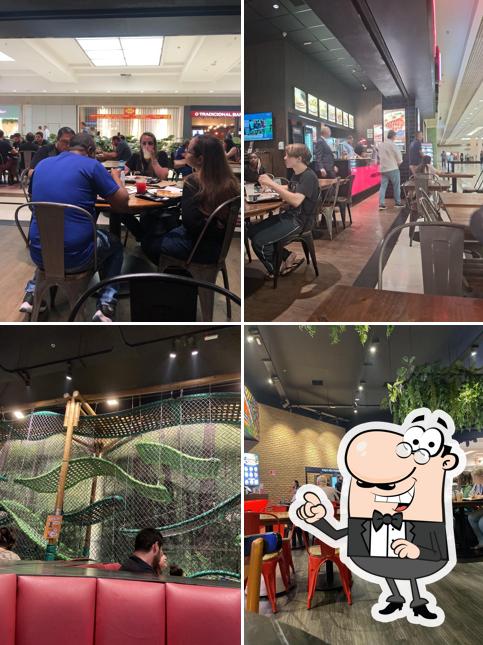 Sente em uma das mesas no Mania de Churrasco | Prime Steak & Burger