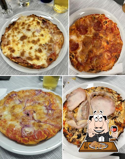 A Pizzeria Al Tegamino Mandis, puoi prenderti una bella pizza