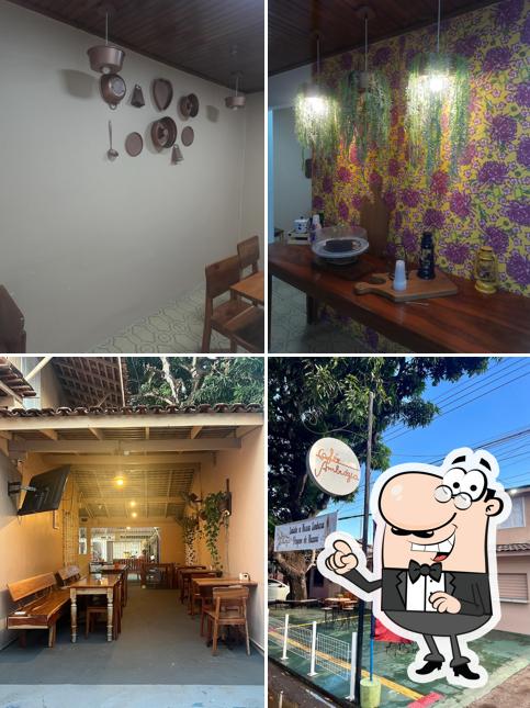 Sente em uma das mesas no Café Ambrózia