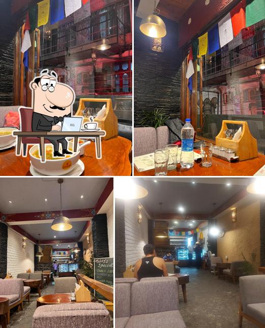 Take a seat at one of the tables at Kalsang Cafe and Restaurant