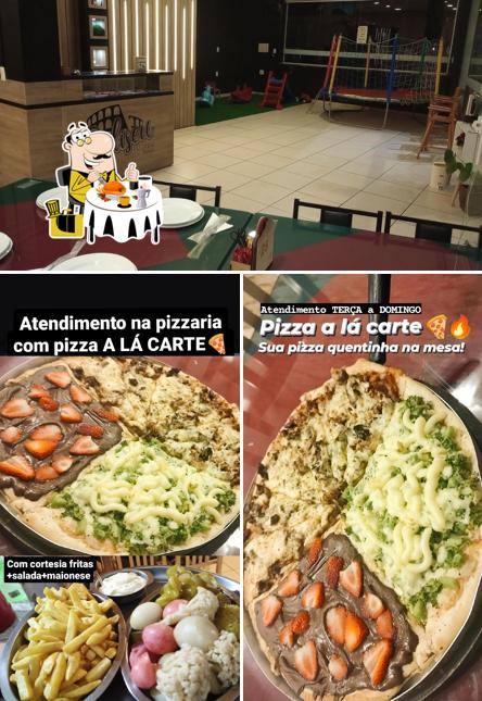 Entre diversos coisas, comida e interior podem ser encontrados no Coliseu Pizzaria/Encantado