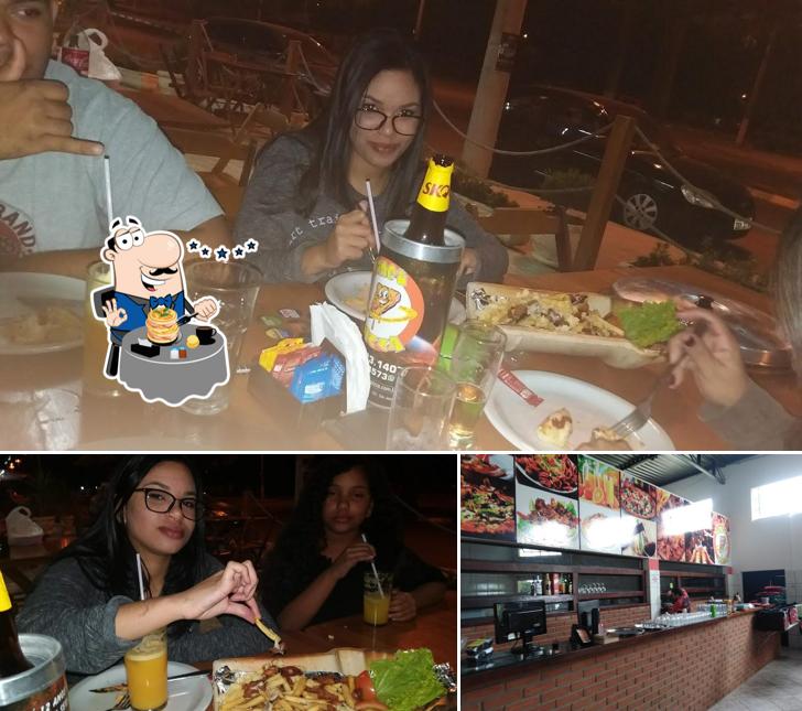 Entre diversos coisas, comida e interior podem ser encontrados no PLANET PIZZA