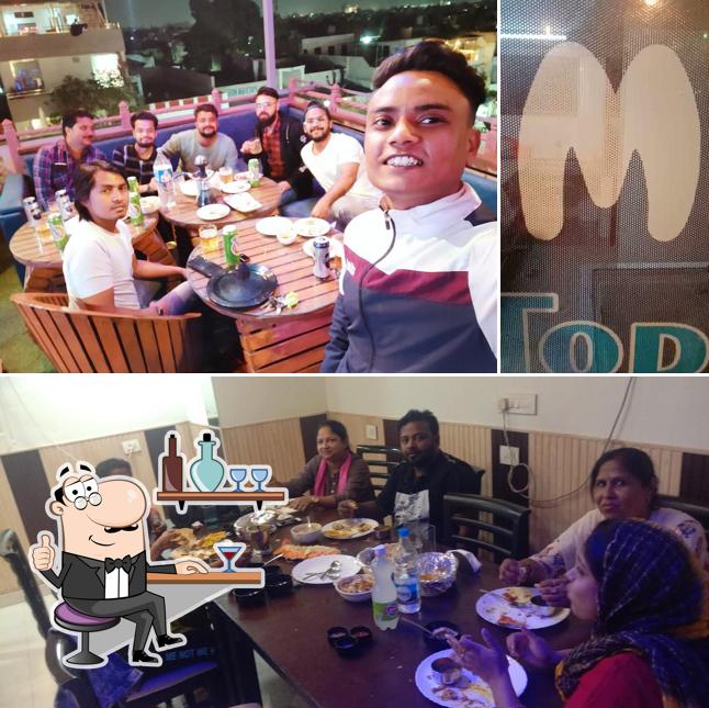 Take a seat at one of the tables at Papa Maddy Food Junction