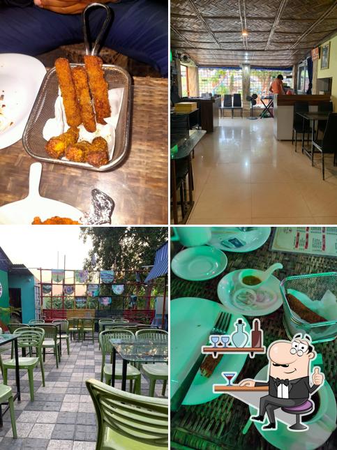 Take a seat at one of the tables at Addabaz Dhaba