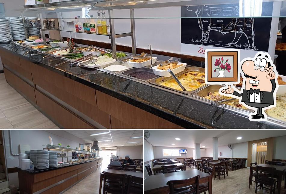 O interior do JR Restaurante Grill em Santa Maria