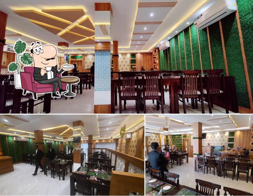 Take a seat at one of the tables at Kanha's Highway Kitchen