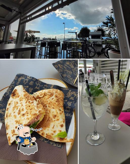 Questa è la immagine che raffigura la cibo e esterno di Tropicana beach bar