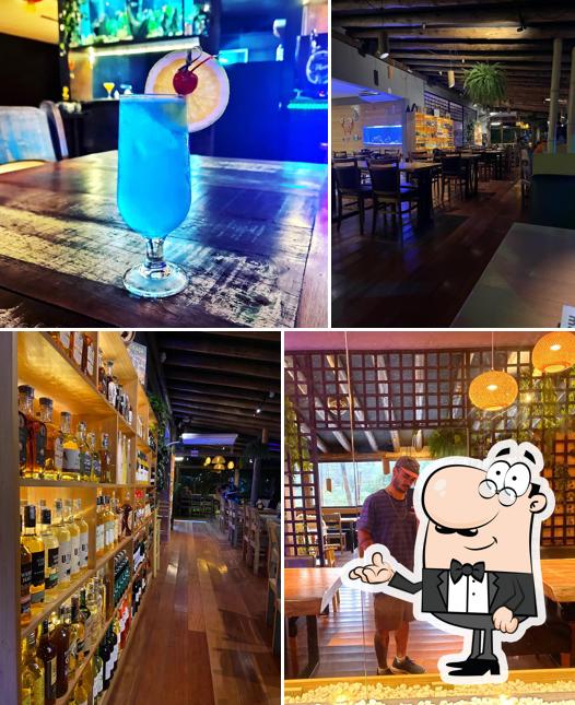 Veja imagens do interior do Cachaçaria Garopaba