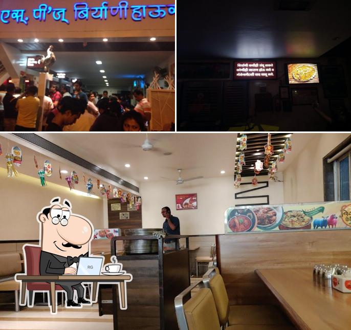 Take a seat at one of the tables at SP's Biryani House Since 1994