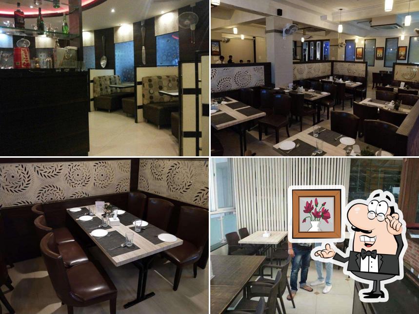 Take a seat at one of the tables at zeal 3 Seasons