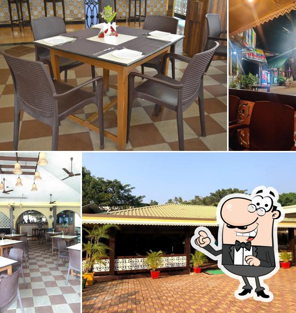 Take a seat at one of the tables at LEDA BPS Garden Restaurant
