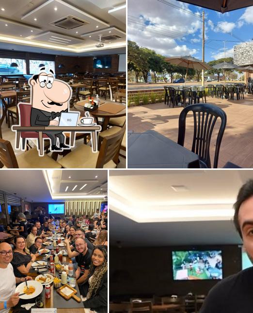 O interior do Divina Grill & Pizza