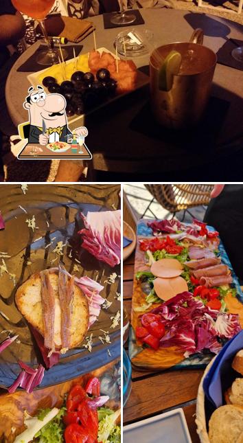 Tra le diverse cose da SeaBar si possono trovare la cibo e tavolo da pranzo