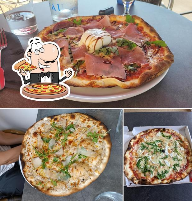 A Restaurant La Piazza Pau, vous pouvez déguster des pizzas