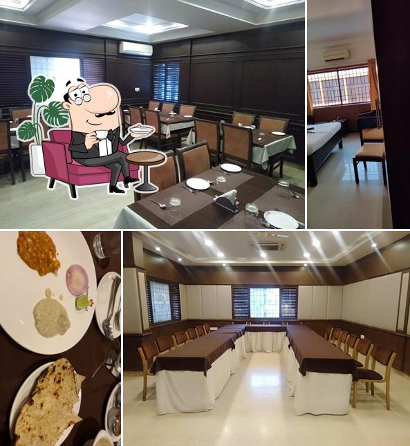 Take a seat at one of the tables at Ananth Residency