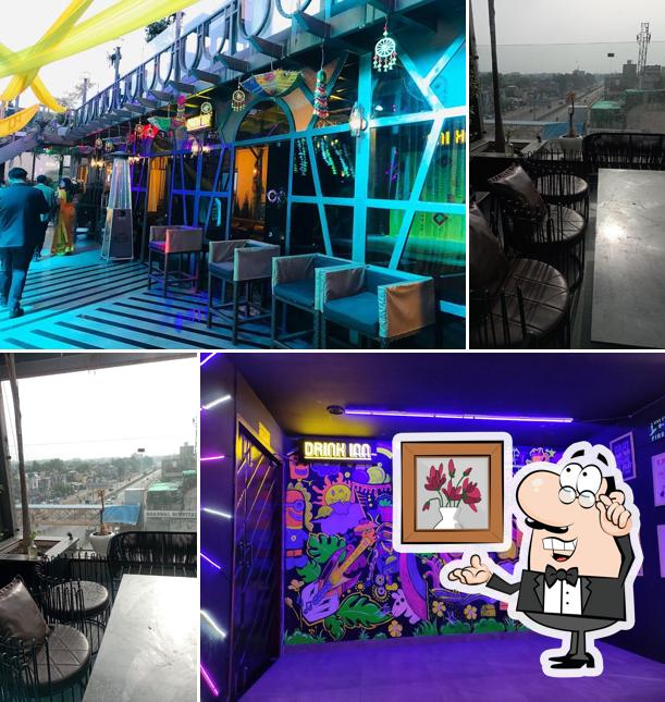 Take a seat at one of the tables at Drink Inn