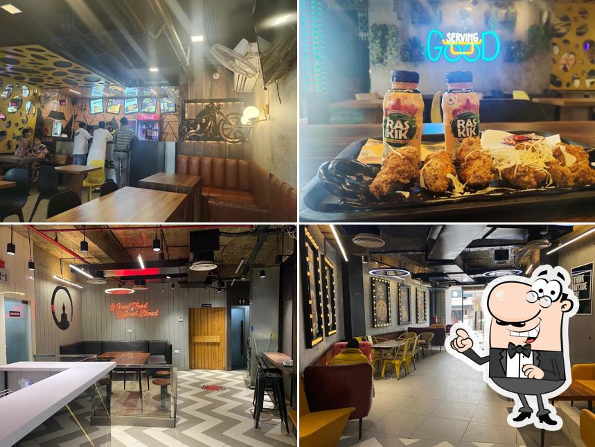 Take a seat at one of the tables at The Hawkers