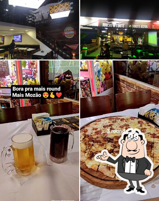 Esta é a imagem apresentando interior e comida no RANCHO FORTE RESTAURANTE