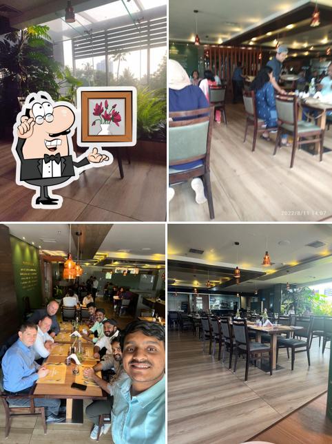 Take a seat at one of the tables at Supreme Uppercrust Kollam