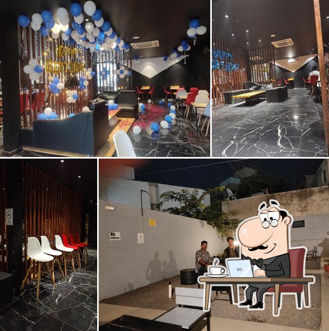 Take a seat at one of the tables at Chai & Snacks Bar - CSB Cafe