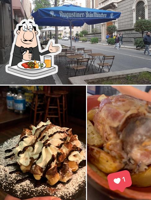 La foto di cibo e interni da Sand Glass Pub