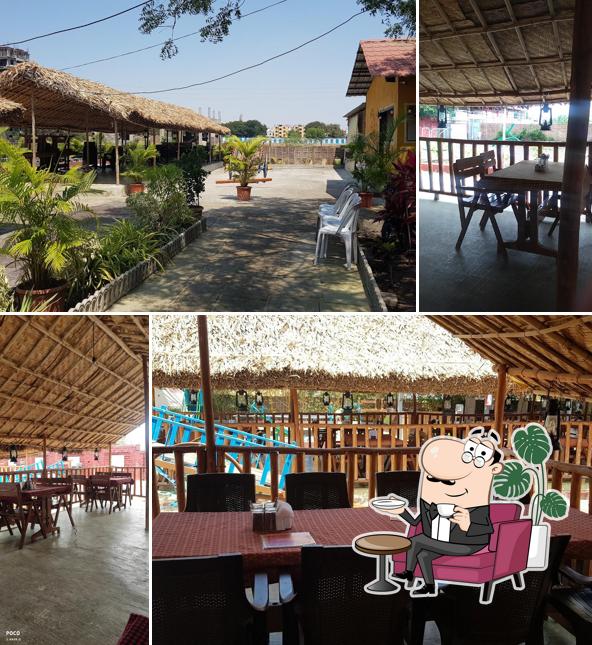 Take a seat at one of the tables at Nagari Village