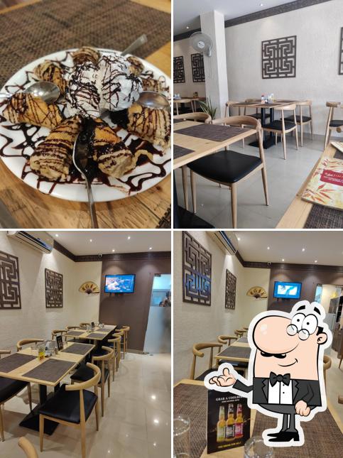Take a seat at one of the tables at BEIJING BITES