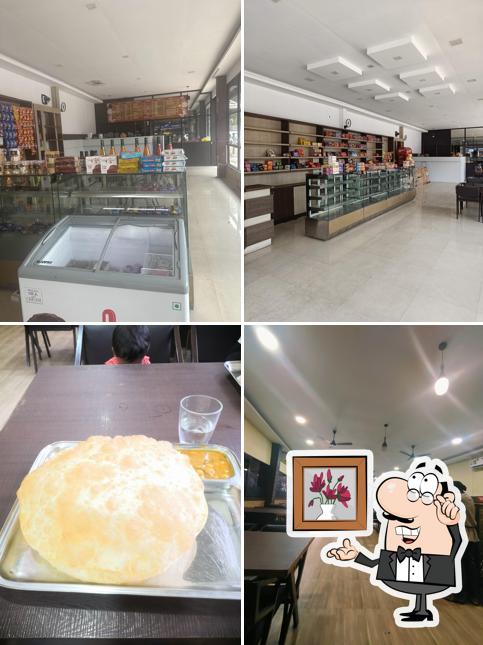 Take a seat at one of the tables at UDUPI BHAVAN