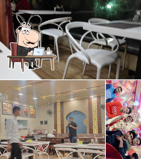 Take a seat at one of the tables at Al-Habibi