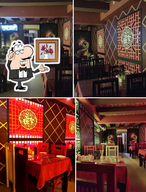 Take a seat at one of the tables at Dragon Inn