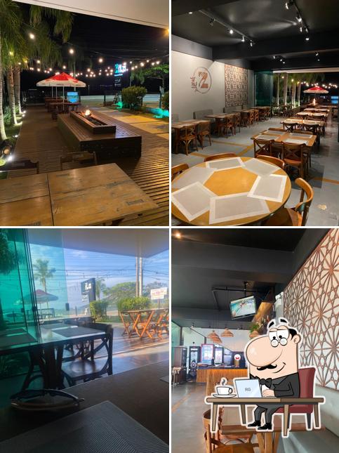 Sente em uma das mesas no Zilá Restaurante & Eventos