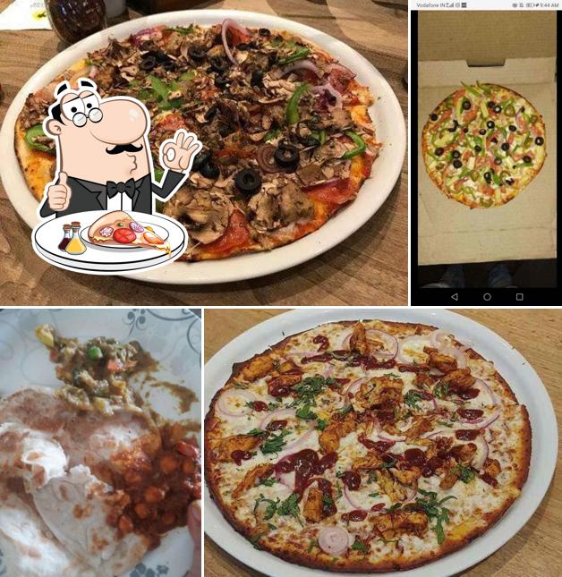 Get pizza at New Cafe Marol