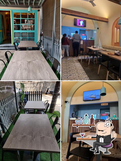 Take a seat at one of the tables at Cafe Nish