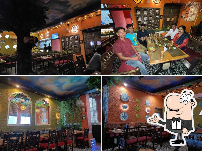 Take a seat at one of the tables at Pind Balluchi Bijnor