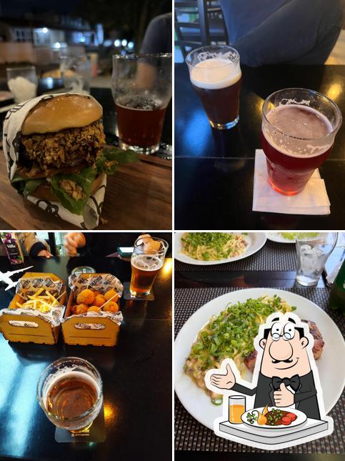 Sanduíche de carne de porco desfiada em Hop Club Gastro Brewpub Cristo Rei