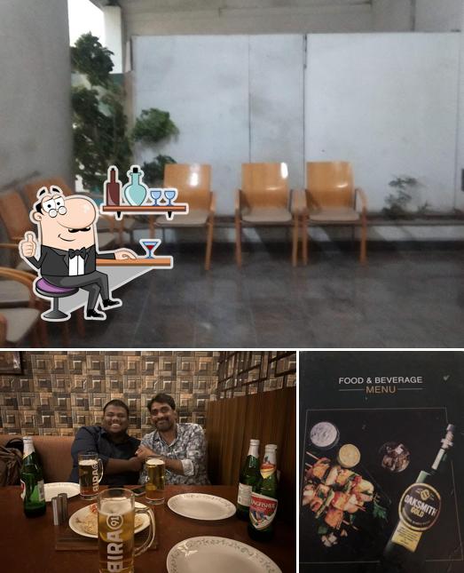 This is the picture depicting interior and food at Bagara Restaurant & Bar