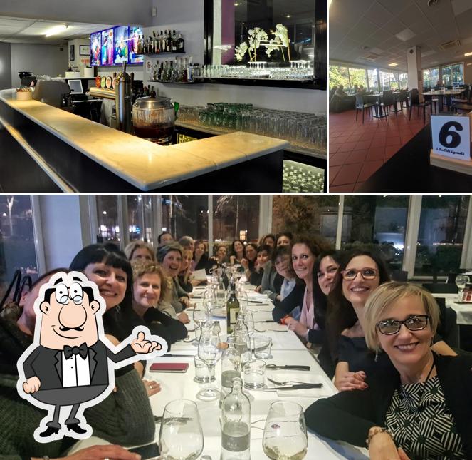 La immagine di interni e bancone da bar da I Soliti Ignoti